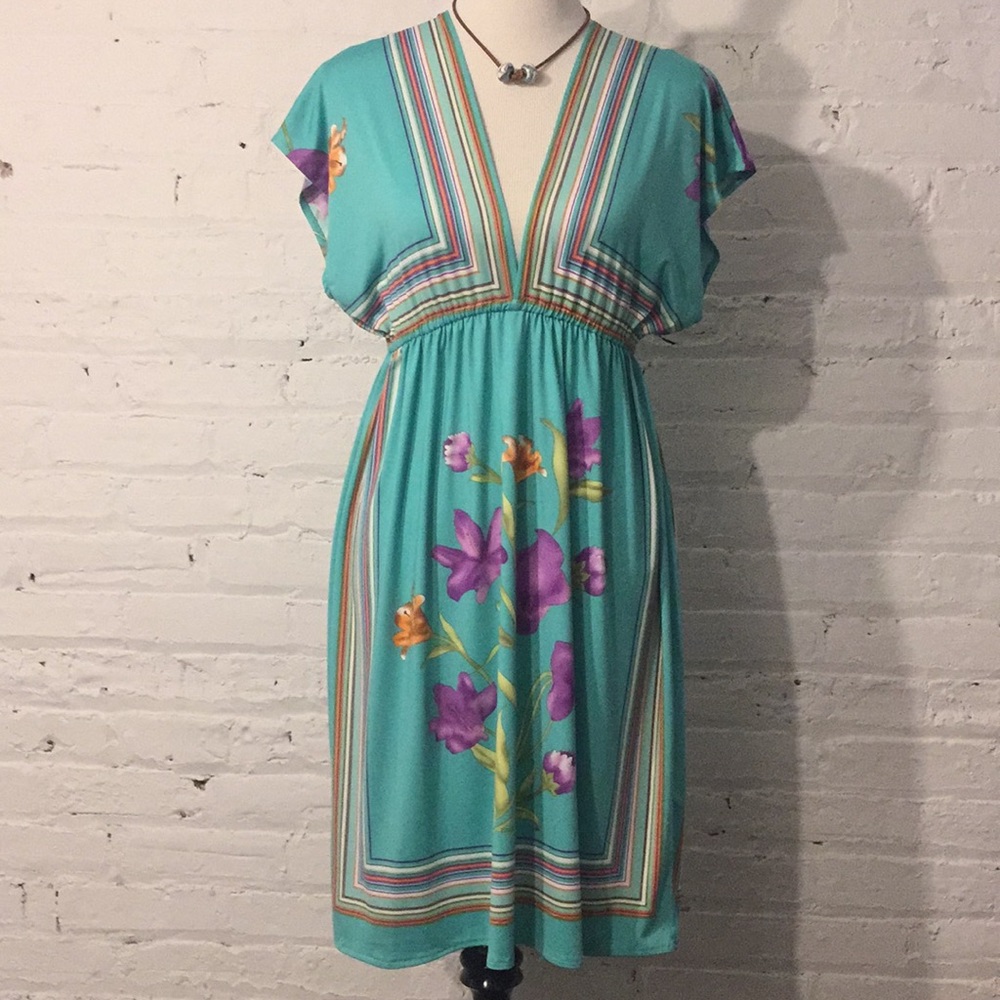 Teal flowered dress with plunging front and back